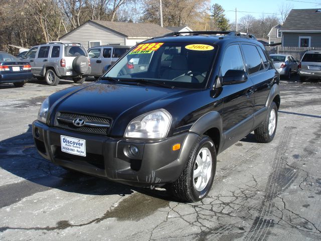 2005 Hyundai Tucson 2002 Saturn