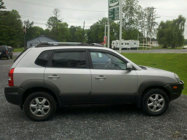 2005 Hyundai Tucson 2002 Saturn