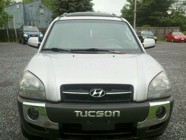 2005 Hyundai Tucson 2002 Saturn