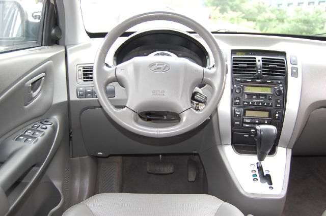 2006 Hyundai Tucson 2002 Saturn