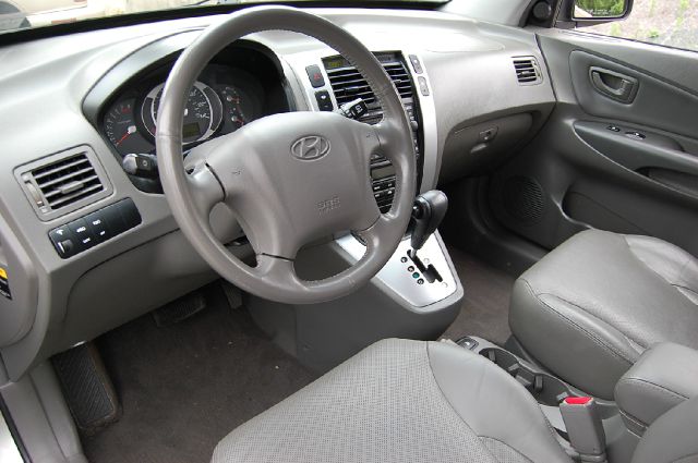 2006 Hyundai Tucson 2002 Saturn