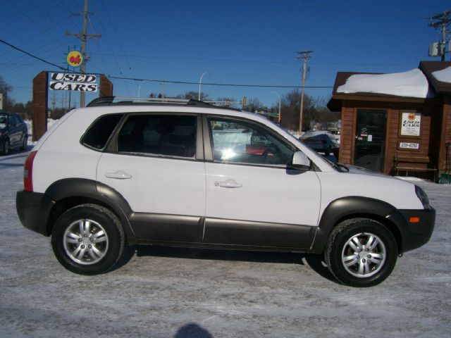 2006 Hyundai Tucson 2002 Saturn