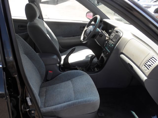 2006 Kia Optima 2lt,awd,7 PASS