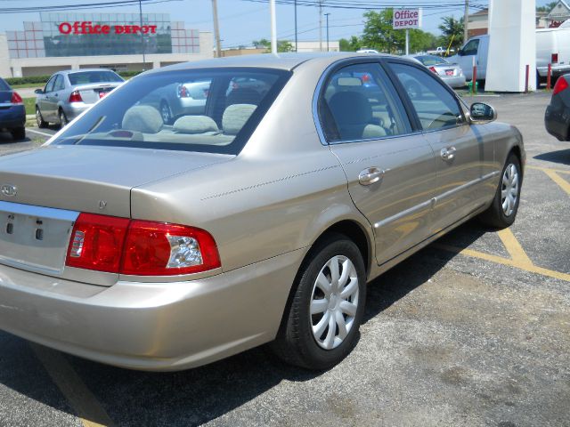 2006 Kia Optima 1998 Jaguar 8