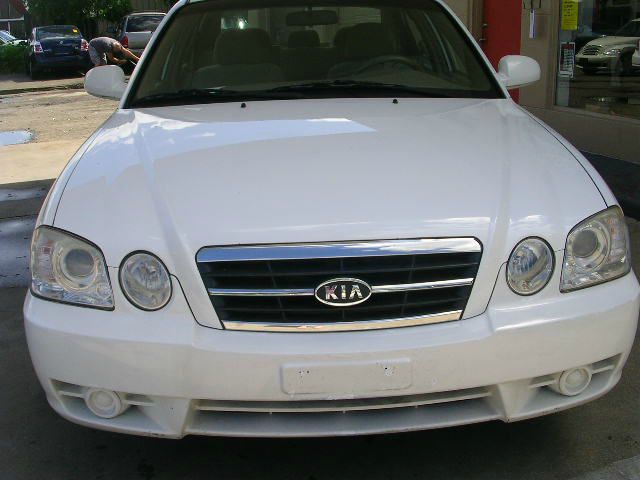 2006 Kia Optima 1998 Jaguar 8