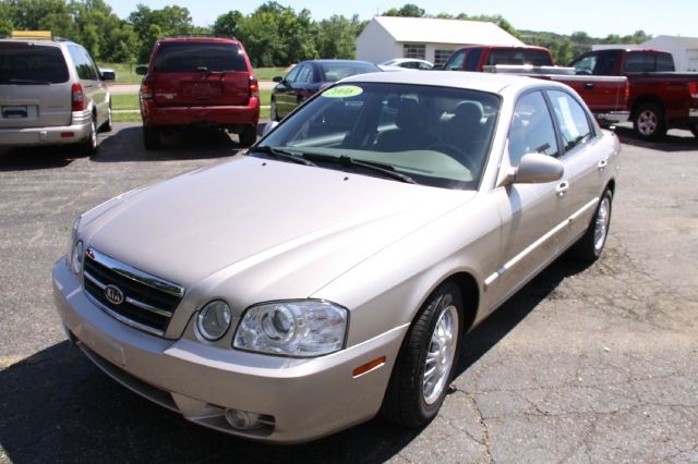 2006 Kia Optima 1998 Jaguar 8