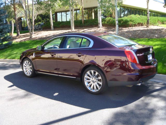 2011 Lincoln MKS 2007 Mazda Mazda3 S Sport