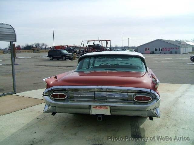 1959 Lincoln Primeier 1995 Pontiac