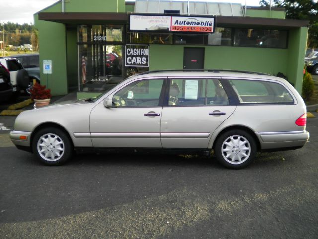 1998 Mercedes-Benz E-Class 2007 Mazda Mazda3 S Sport