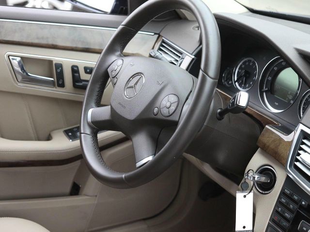 2010 Mercedes-Benz E-Class 2010 Nissan 2.0S