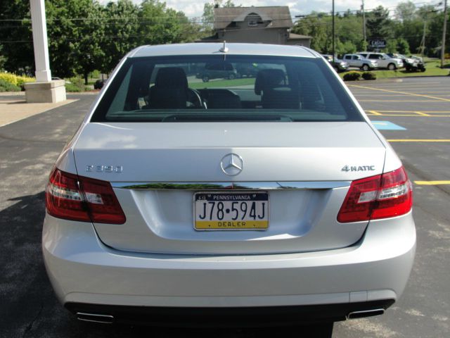 2010 Mercedes-Benz E-Class 2010 Nissan 2.0S