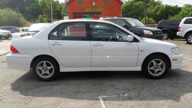 2002 Mitsubishi Lancer LE 2WD 7-pass