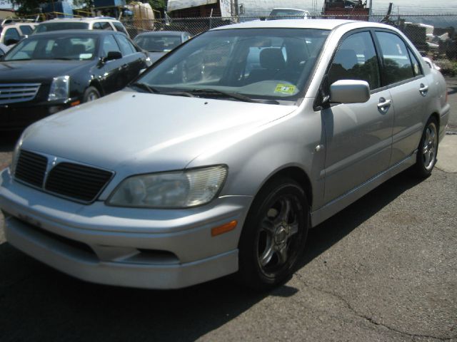 2003 Mitsubishi Lancer LE 2WD 7-pass