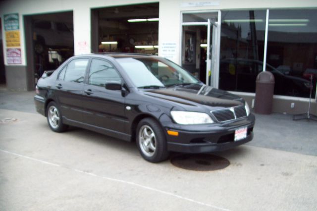 2003 Mitsubishi Lancer LE 2WD 7-pass