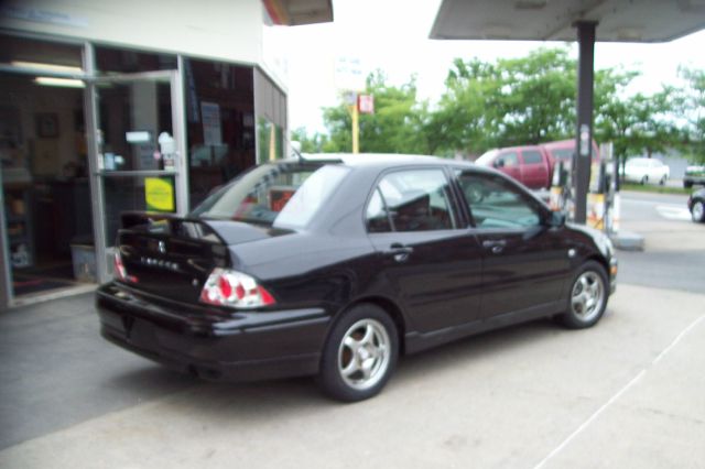 2003 Mitsubishi Lancer LE 2WD 7-pass