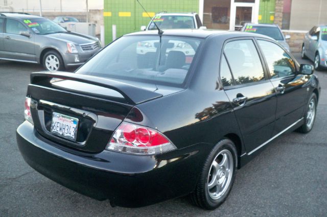 2004 Mitsubishi Lancer LE 2WD 7-pass