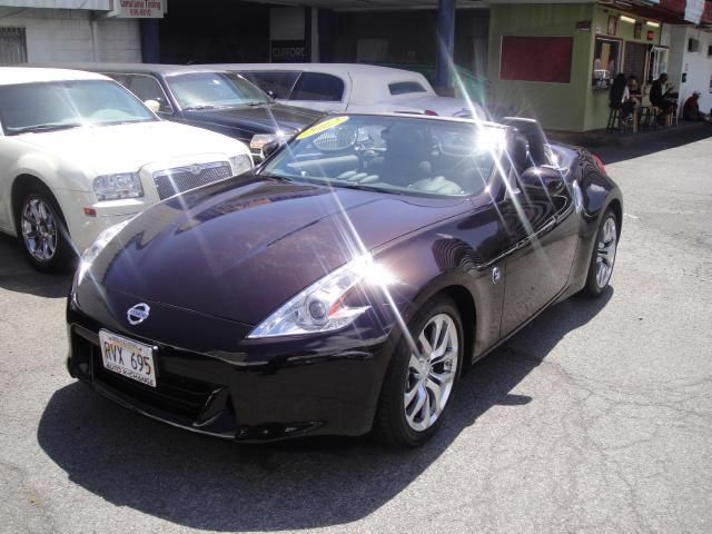 2012 Nissan 370Z 1998 Ford XL