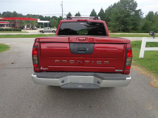 2001 Nissan Frontier 2004 Jeep Sport