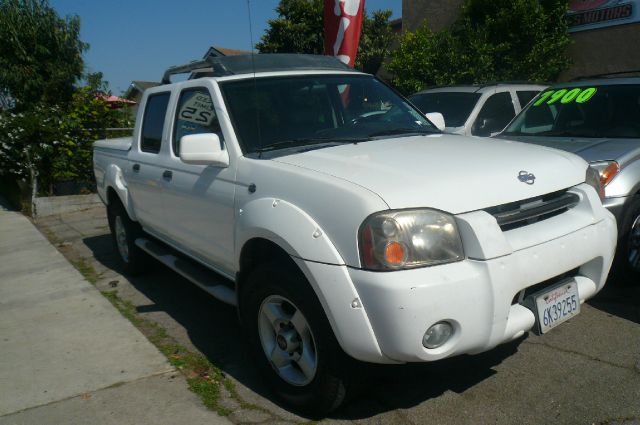 2001 Nissan Frontier 2004 Jeep Sport