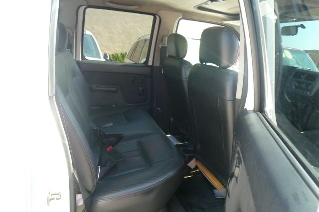 2001 Nissan Frontier 2004 Jeep Sport