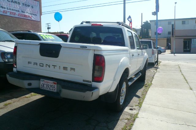 2001 Nissan Frontier 2004 Jeep Sport