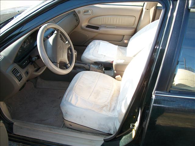 1997 Nissan Maxima SLE Ext. Cab Short Bed 4WD