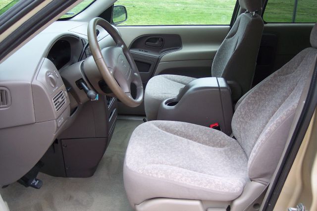 1999 Nissan Quest 2002 Chevrolet LTZ