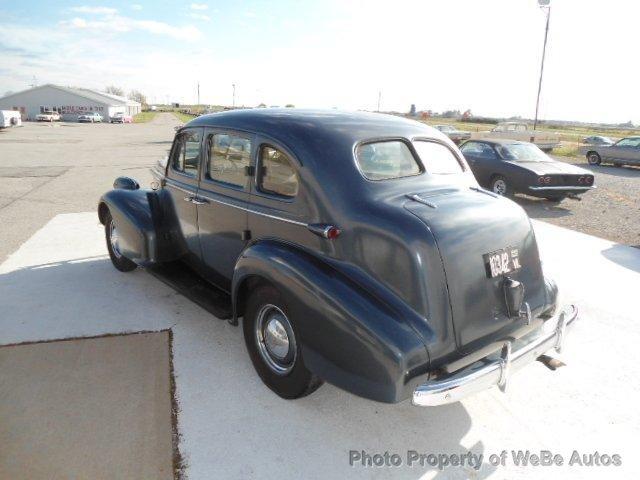 1938 Oldsmobile 4 Door 1995 Pontiac