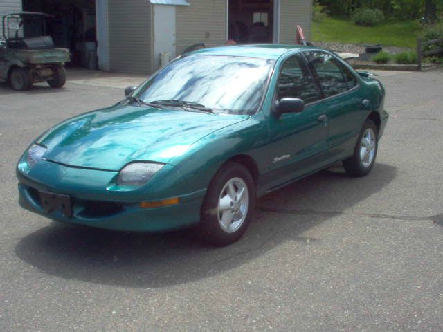 1999 Pontiac Sunfire 2006 Hyundai LX