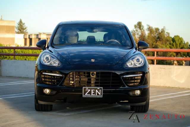 2011 Porsche Cayenne 2007 Mazda Mazda3 S