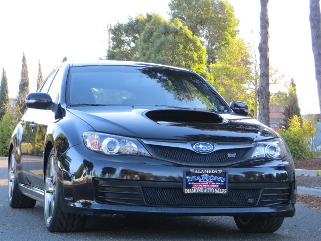 2008 Subaru Impreza 1994 GMC