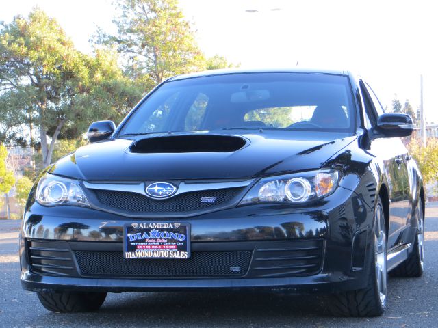 2008 Subaru Impreza 1994 GMC