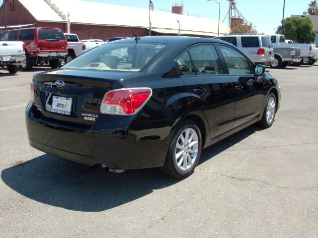 2012 Subaru Impreza 4dr LE Auto 4WD