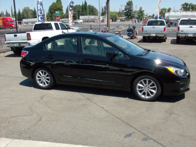 2012 Subaru Impreza 4dr LE Auto 4WD