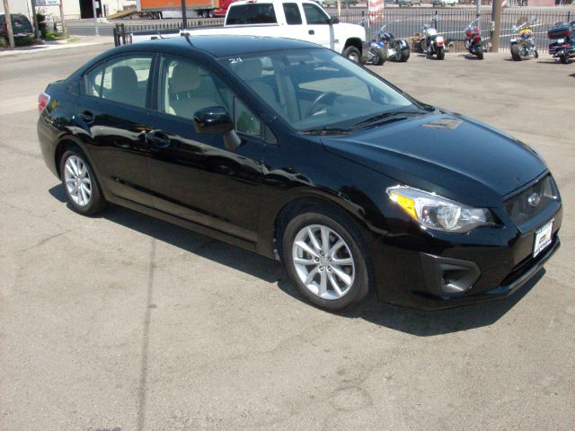 2012 Subaru Impreza 4dr LE Auto 4WD