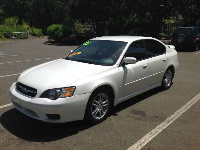 2005 Subaru Legacy Ford F250 FX4 Lariat