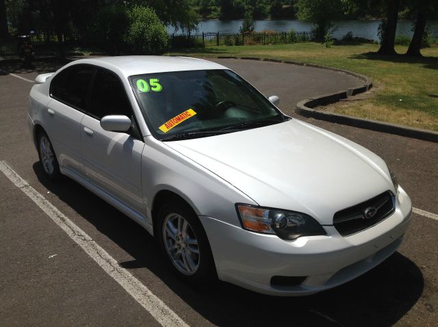 2005 Subaru Legacy Ford F250 FX4 Lariat