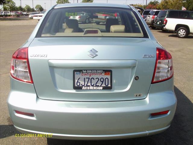 2009 Suzuki SX4 Sedan 2006 Mazda I