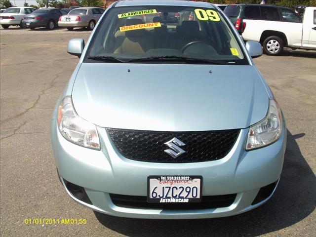 2009 Suzuki SX4 Sedan 2006 Mazda I