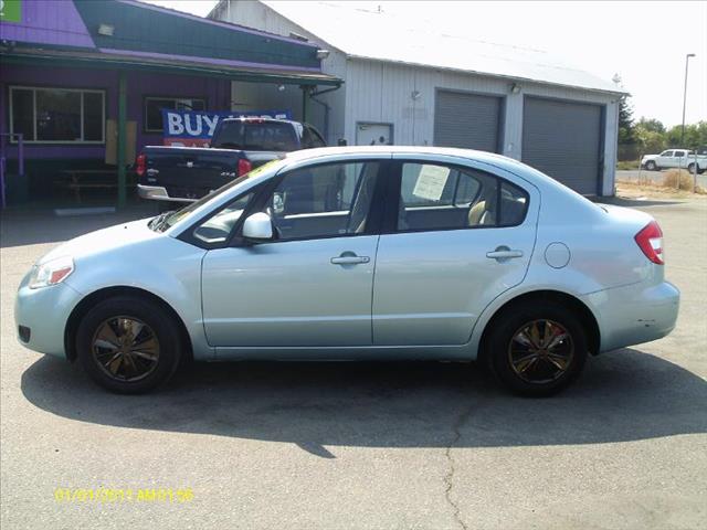 2009 Suzuki SX4 Sedan 2006 Mazda I