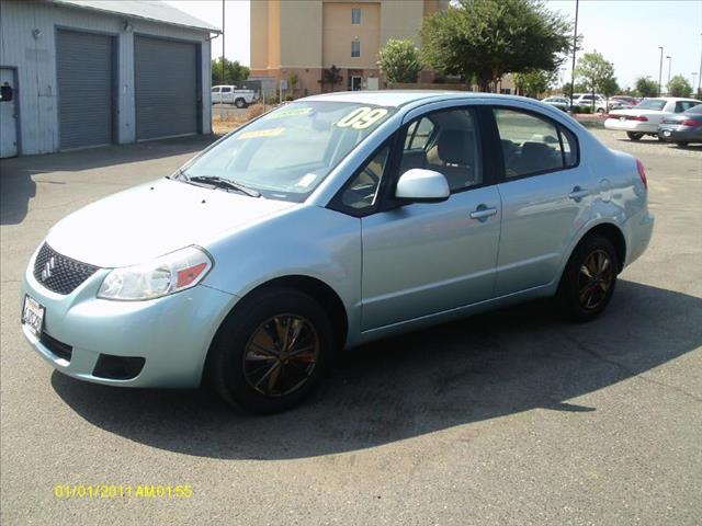 2009 Suzuki SX4 Sedan 2006 Mazda I