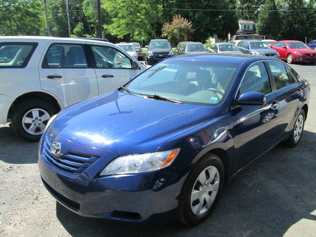 2009 Toyota Camry 2002 Ford KING Ranch