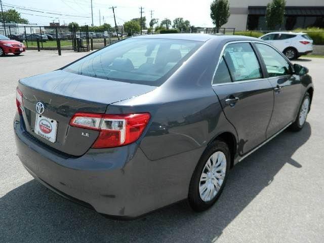 2013 Toyota Camry 2008 Chrysler LX