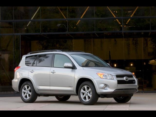 2011 Toyota RAV4 2006 Subaru Outback Sport