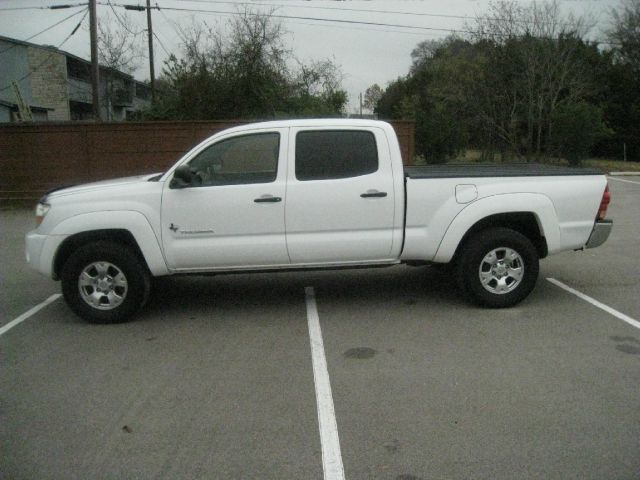 2005 Toyota Tacoma 2011 Kia SX