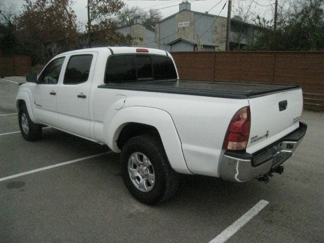 2005 Toyota Tacoma 2011 Kia SX