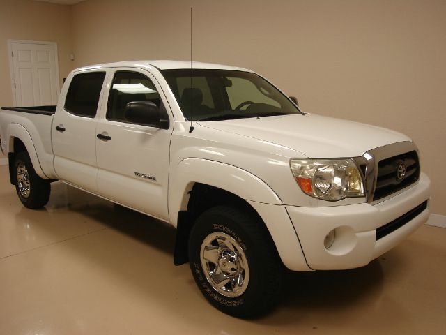 2005 Toyota Tacoma 2011 Kia SX