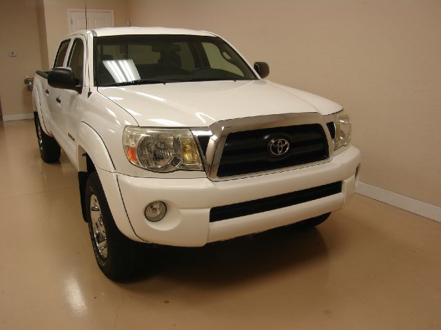 2005 Toyota Tacoma 2011 Kia SX