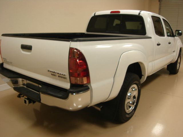 2005 Toyota Tacoma 2011 Kia SX