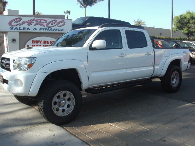 2005 Toyota Tacoma 2011 Kia SX